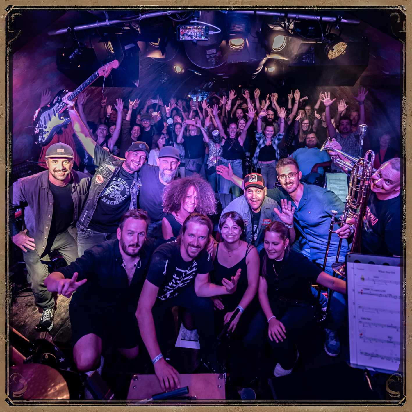 A view from the stage to a packed bar at Rockhouse Salzburg.  The Band Brother Buffalo are at the front of the photo.
